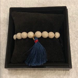 Beaded bracelet with tassels